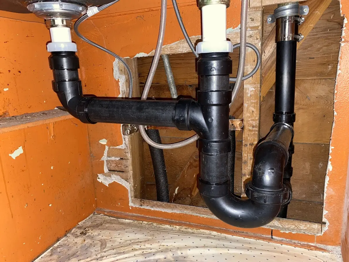 Professional Garbage Disposal Repair equipment and tools on the job in Bunnell